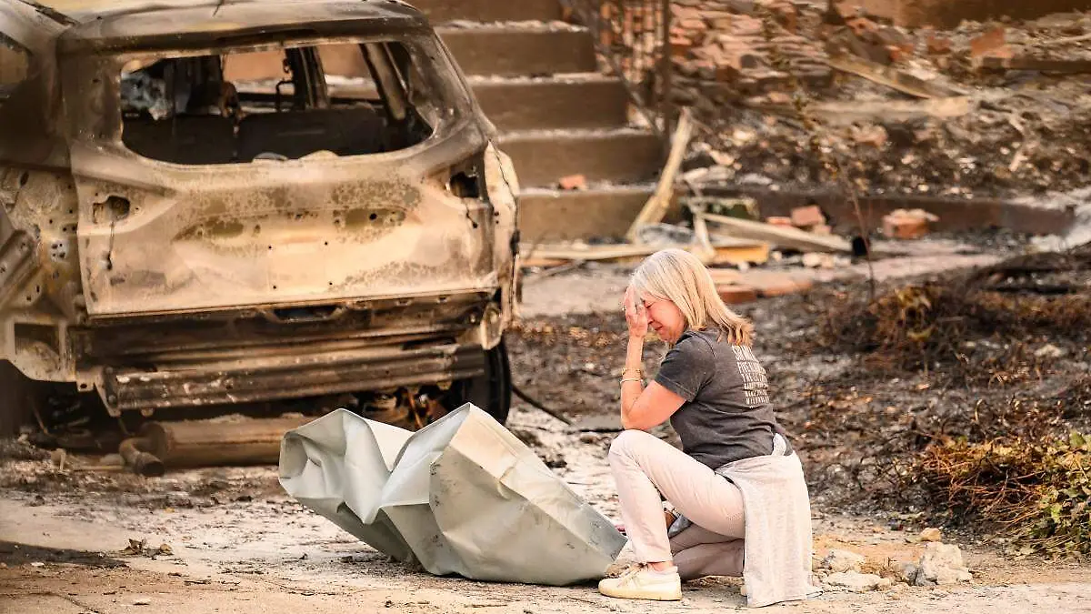 AFP__20260805__C3YN9PE__v2__MidRes__ThousandsToldToEvacuateAsWildfiresWorsenInWashin