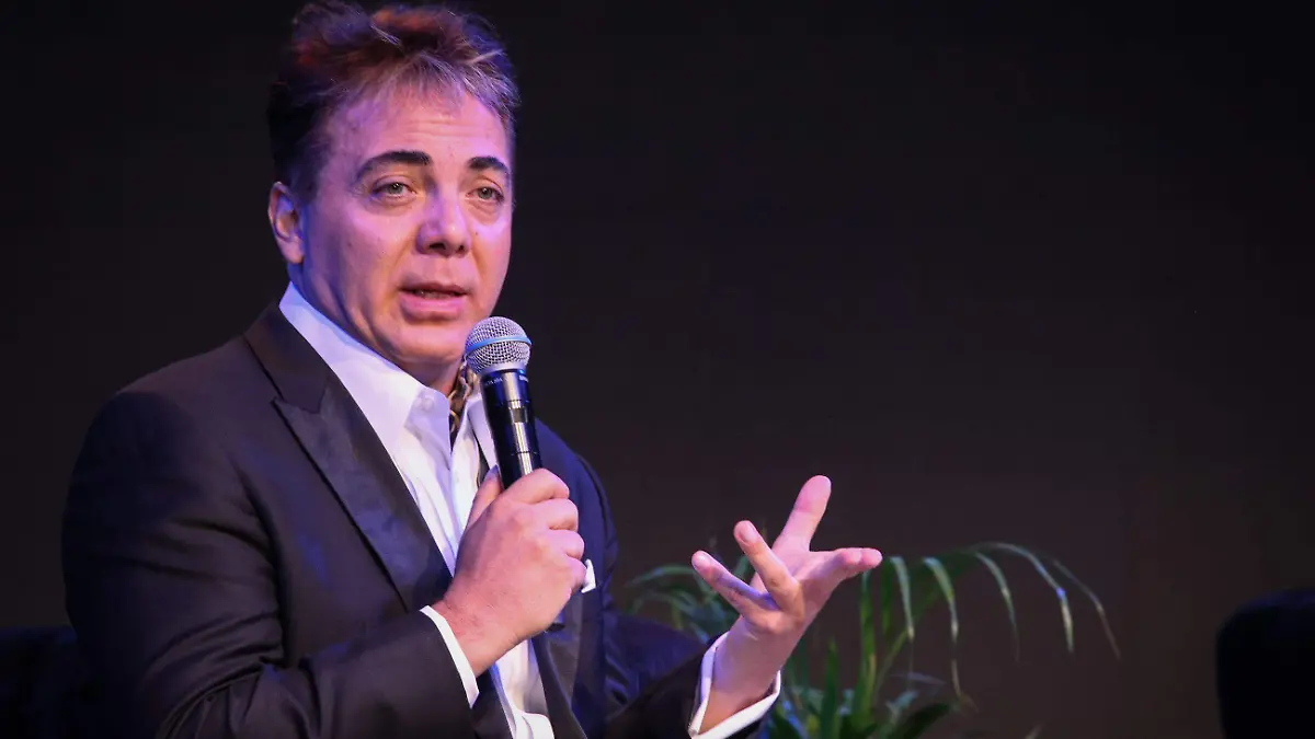 966972_Conferencia Yuri y Cristian Castro_impreso