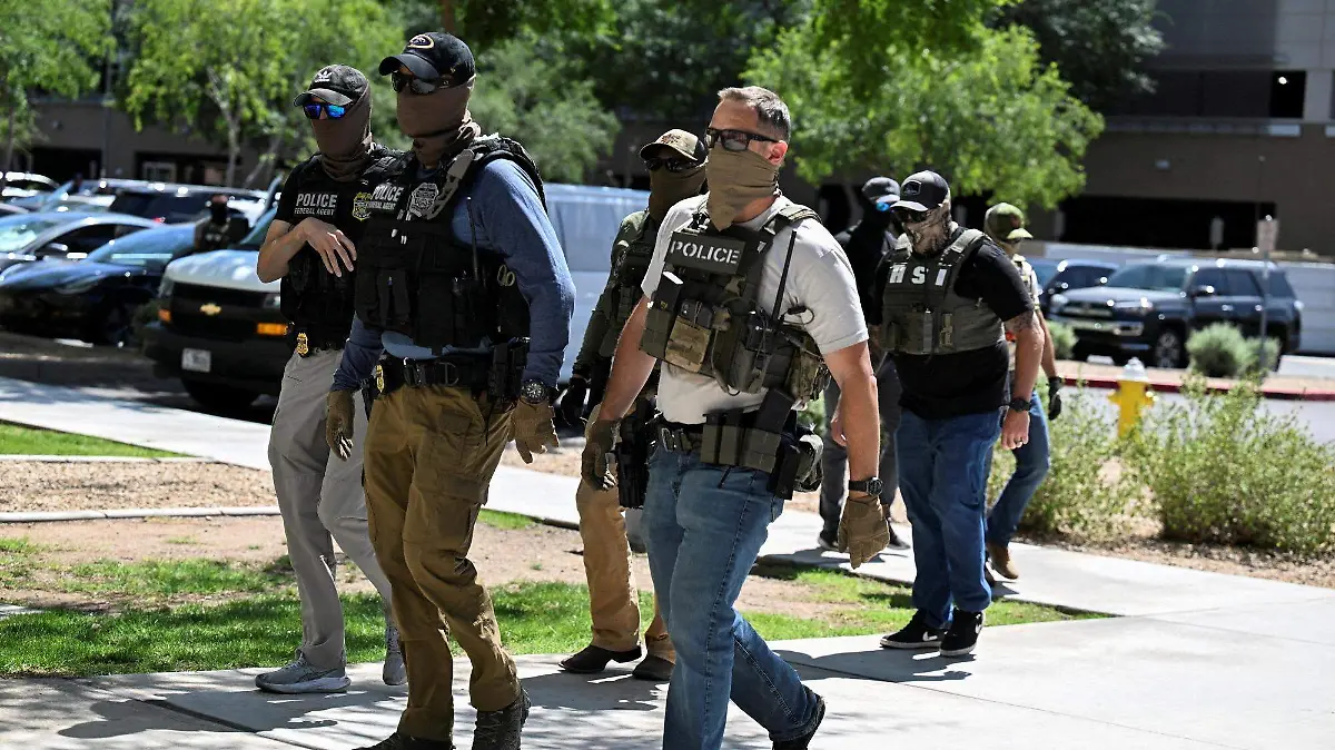 2026-08-13T010844Z_2039020134_RC2MMEAR62Y2_RTRMADP_3_USA-TRUMP-ICE-GLOVES