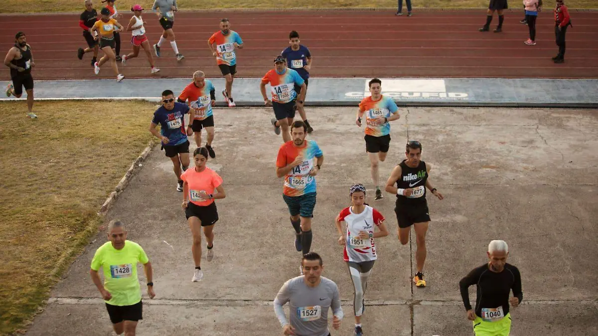 Corredores en carrera atlética
