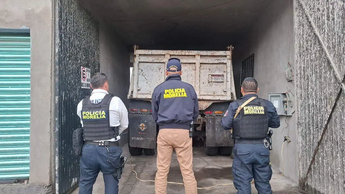 Policía Morelia con vehículo resguardado