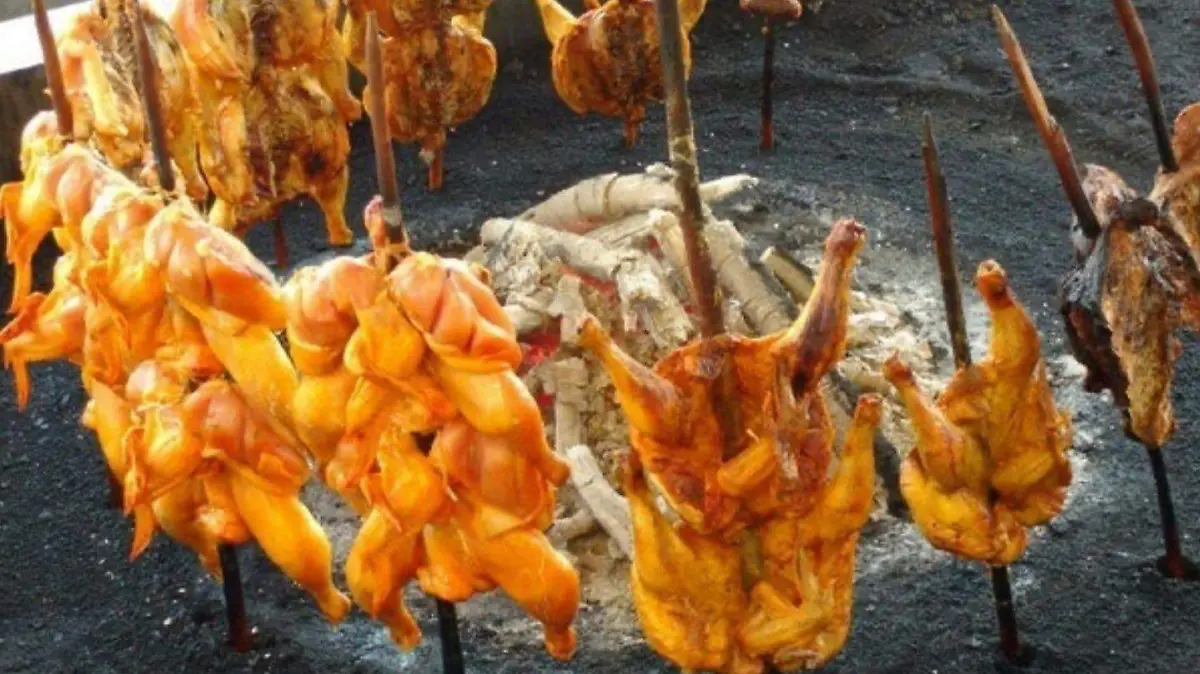 pollo en vara asados