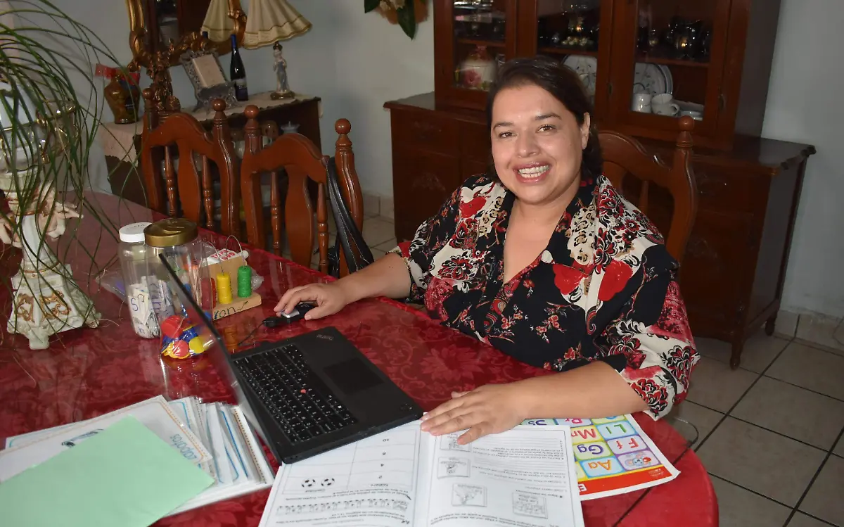 maestra 3 nota y foto de javier