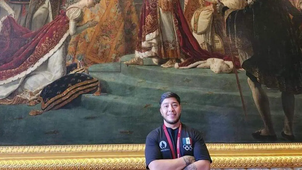 En El Palacio de Versalles con La Consagración de Napoleón de fondo
