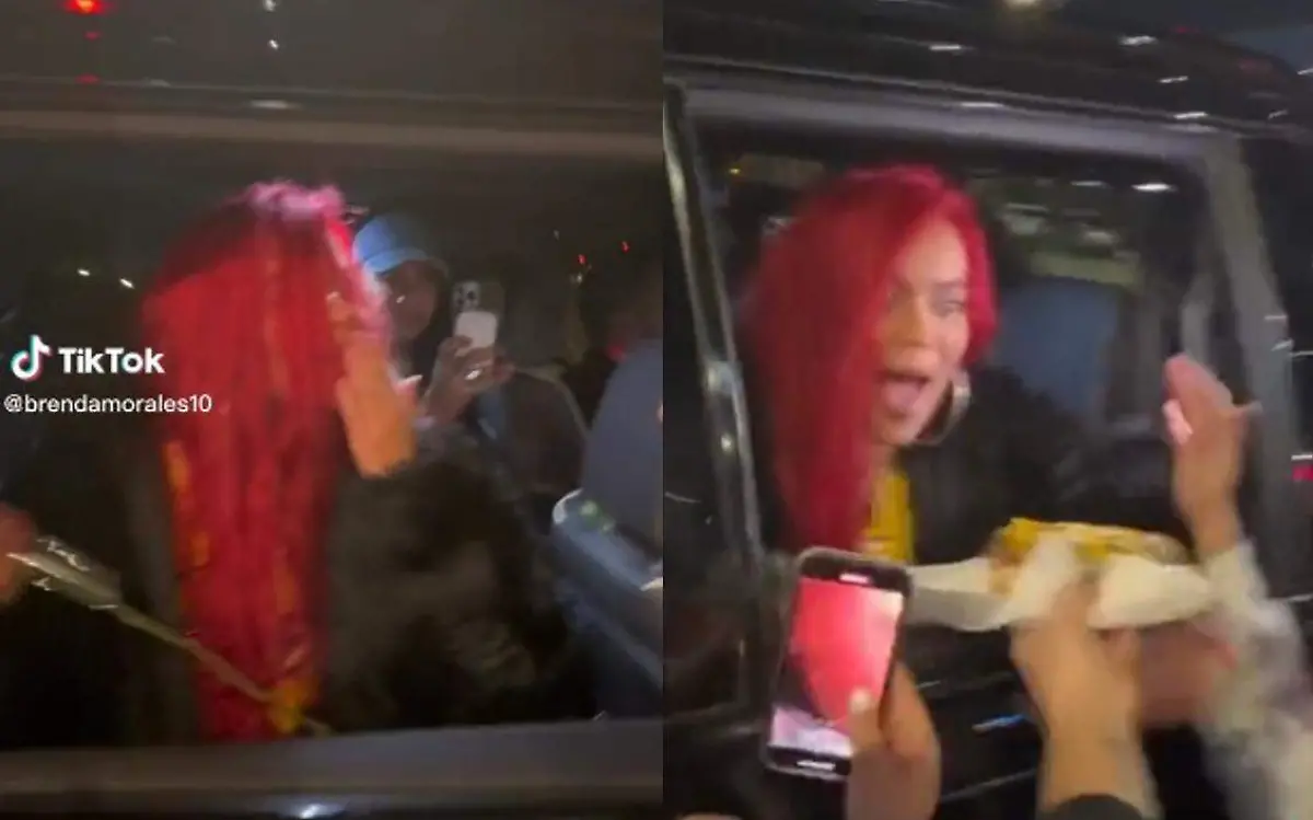 Karol G recibe hot dogs de una fan