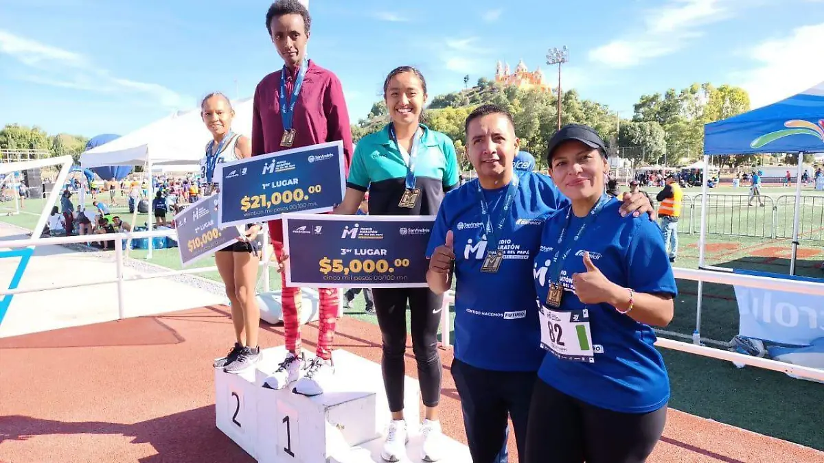 Shewarge Amare Alene en la cima del podio