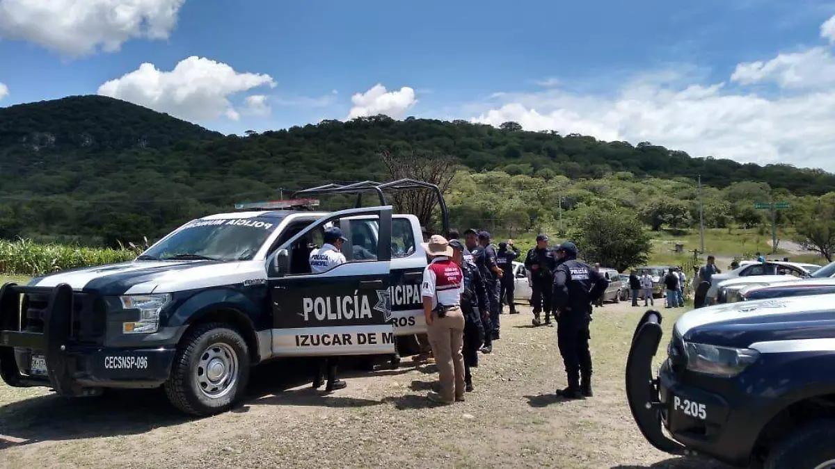 policía muerto Izucar
