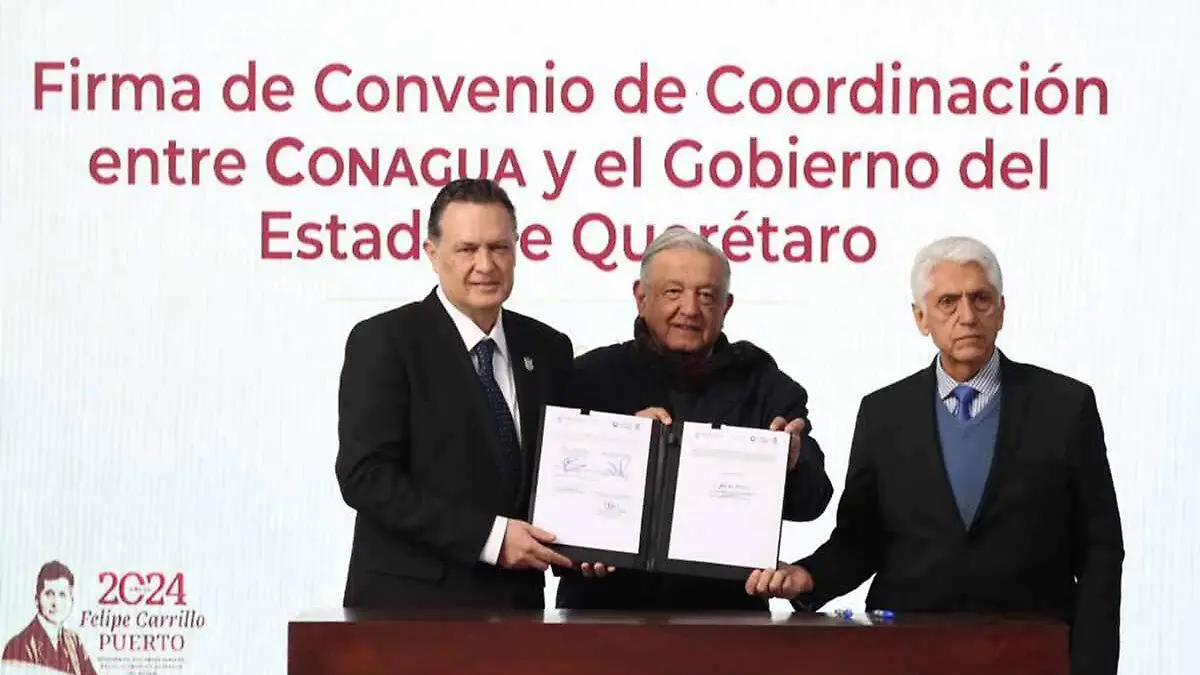 AMLO firma convenio