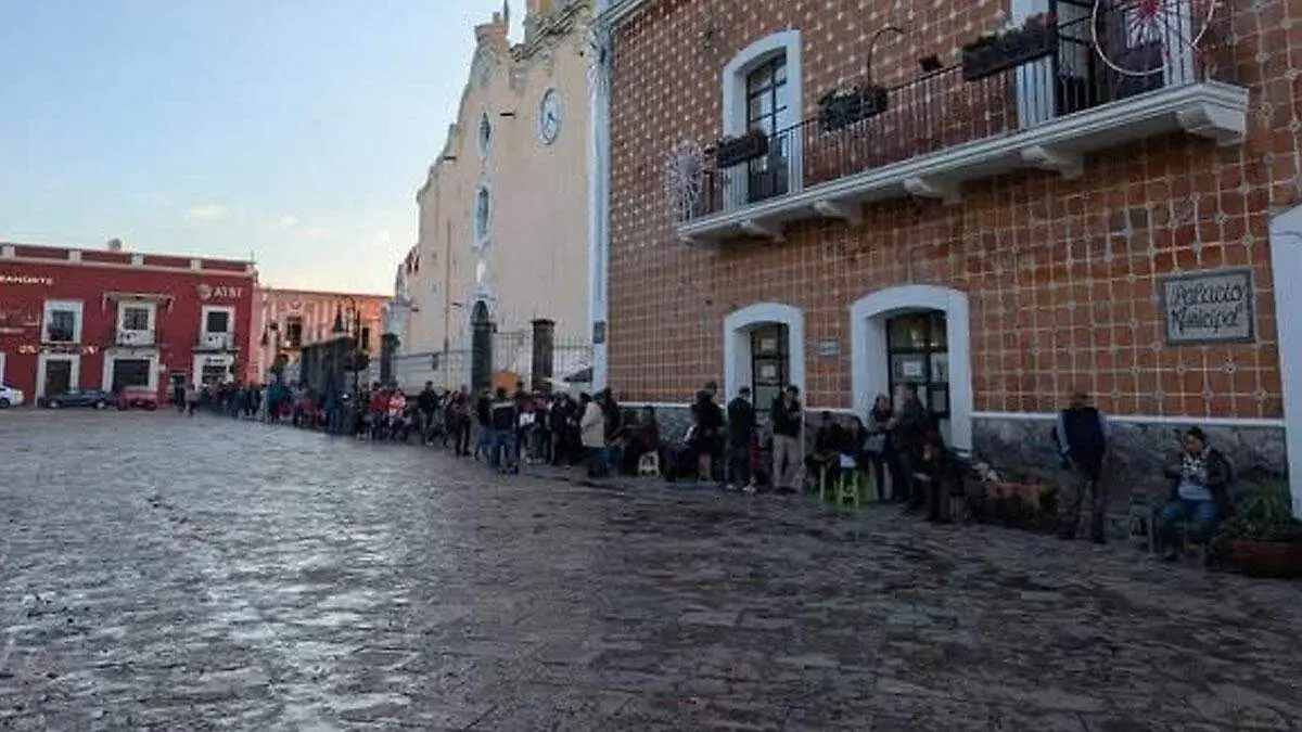 filas para el boletos por el huey 