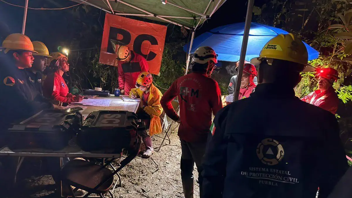 localizan muertos a turistas atrapados en cuetzalan