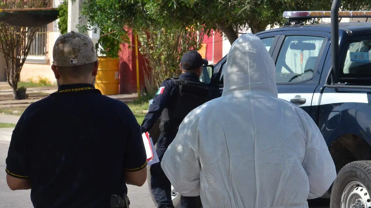 Localizan taxi con cadáveres  (1)