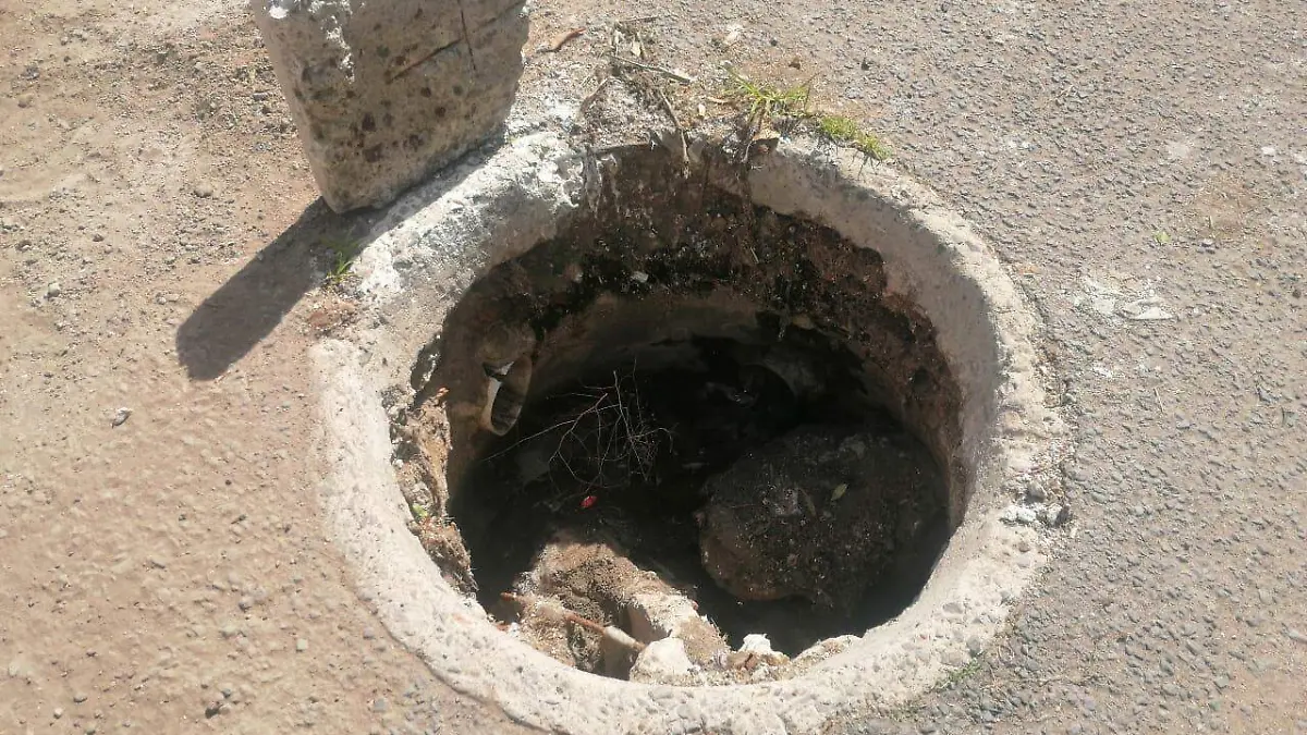 REGITROS ABIERTOS DE DRENAJE PROVOCAN ACCIDENTES 1