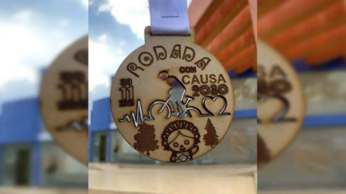 Medalla alusiva a la carrera Concausa. Foto Cortesía Juventud Amealco.