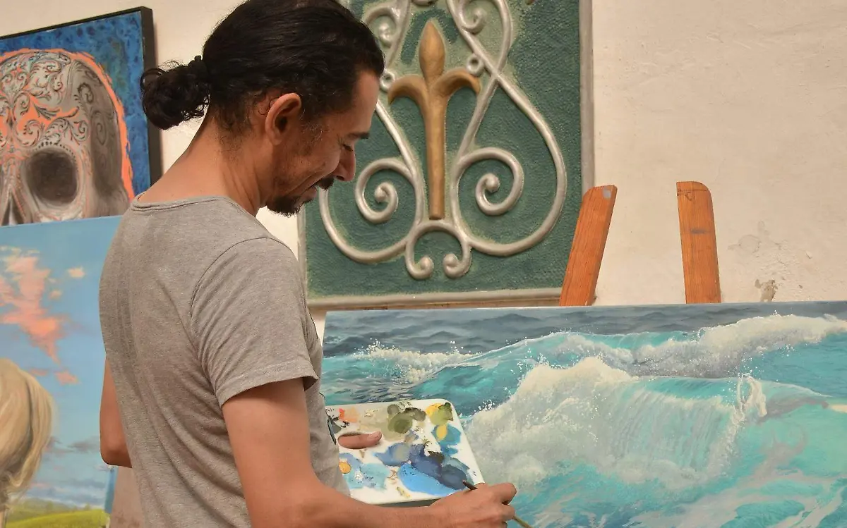 SJR Efraín con el arte de la pintura