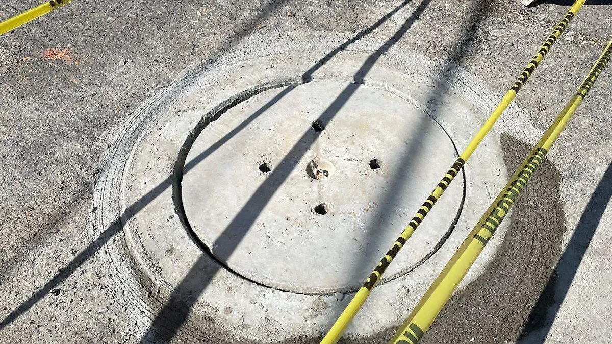 tapa de un pozo de visita