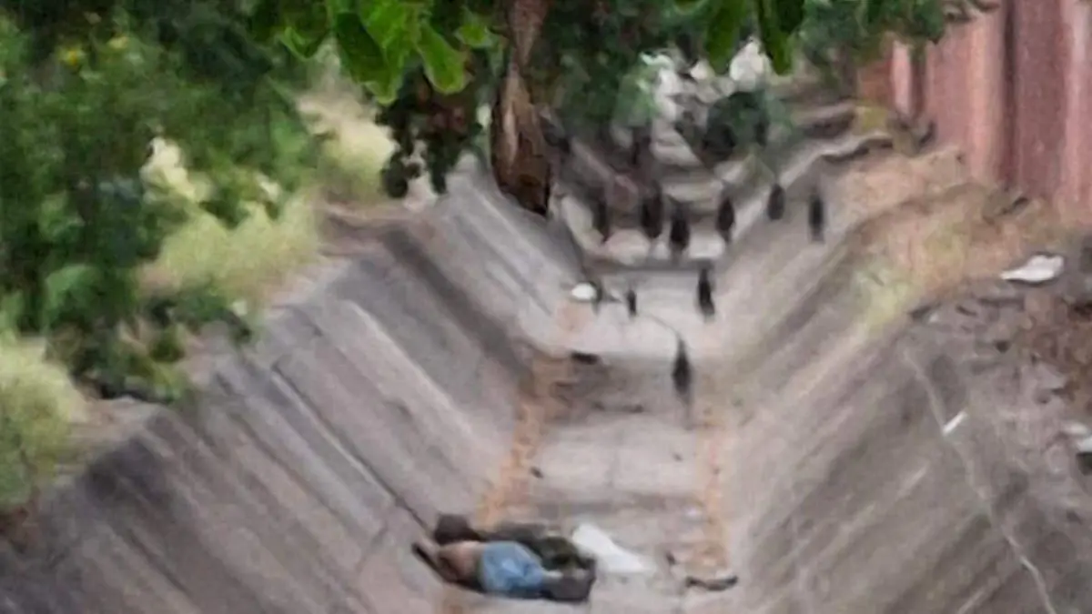 muerto en canal de desague cln