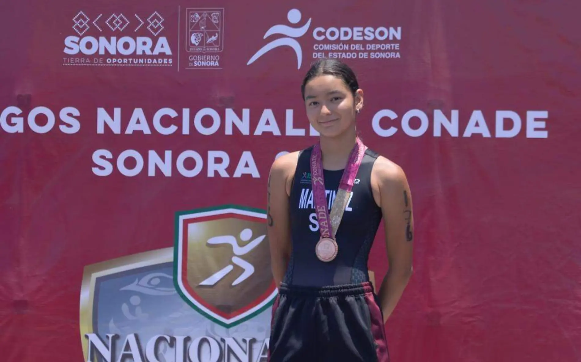 medalla-de-bronce-triatlon