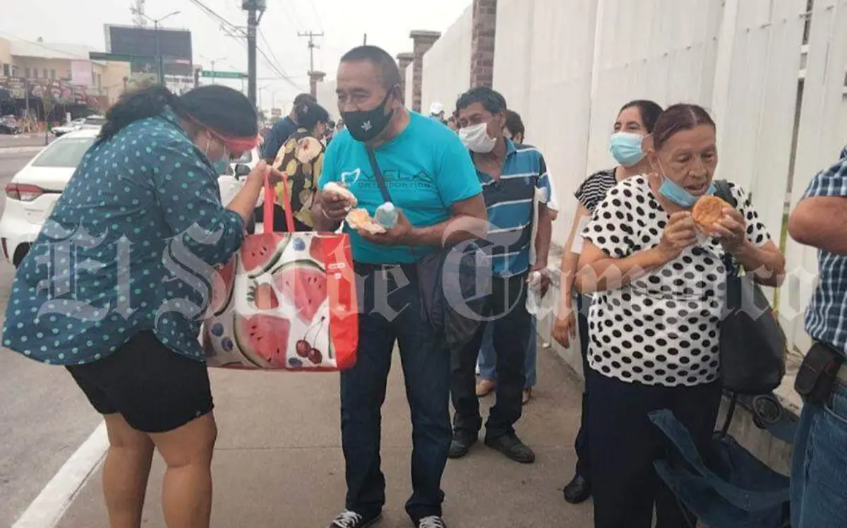 FILA DE VACUNACIÓN