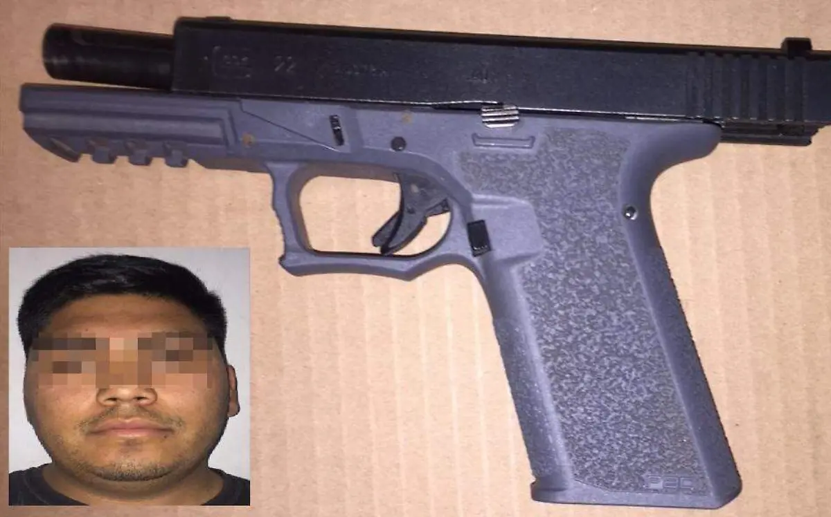 arma y detenido