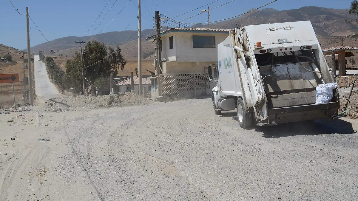 Calle no pavimentada, colonia