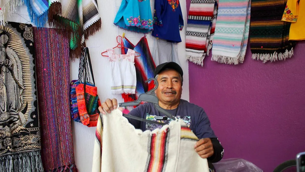 artesanos con sarape 3.