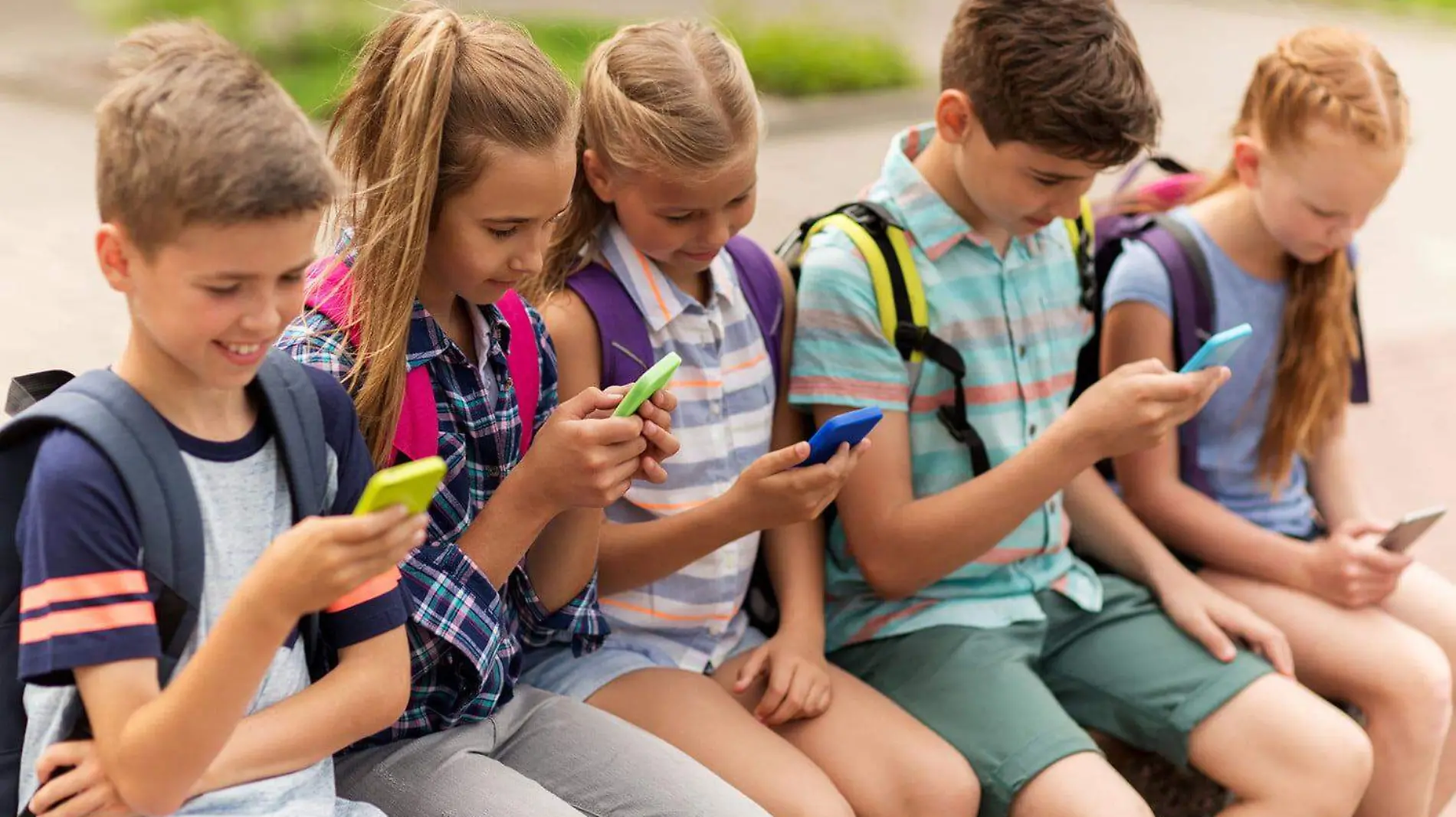 stock-kids-on-cell-phone