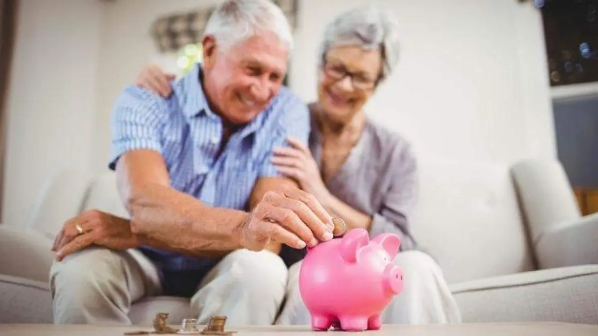 MoneyMagpie_Over-50-Elderly-Retired-Piggy-Bank-Money-Save-_Cropped-730x403