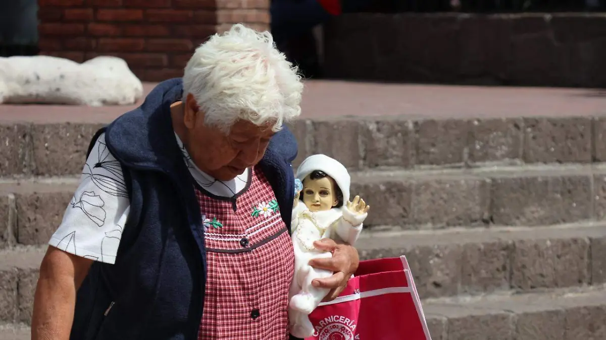 Católica Niño Dios 