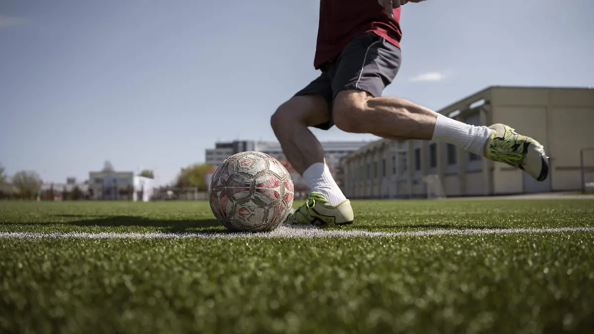 side-view-man-playing-soccer