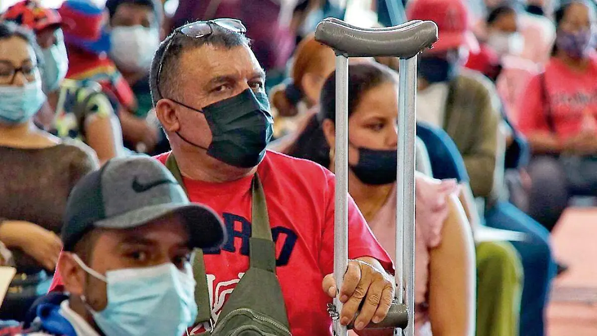 Personas con cubrebocas