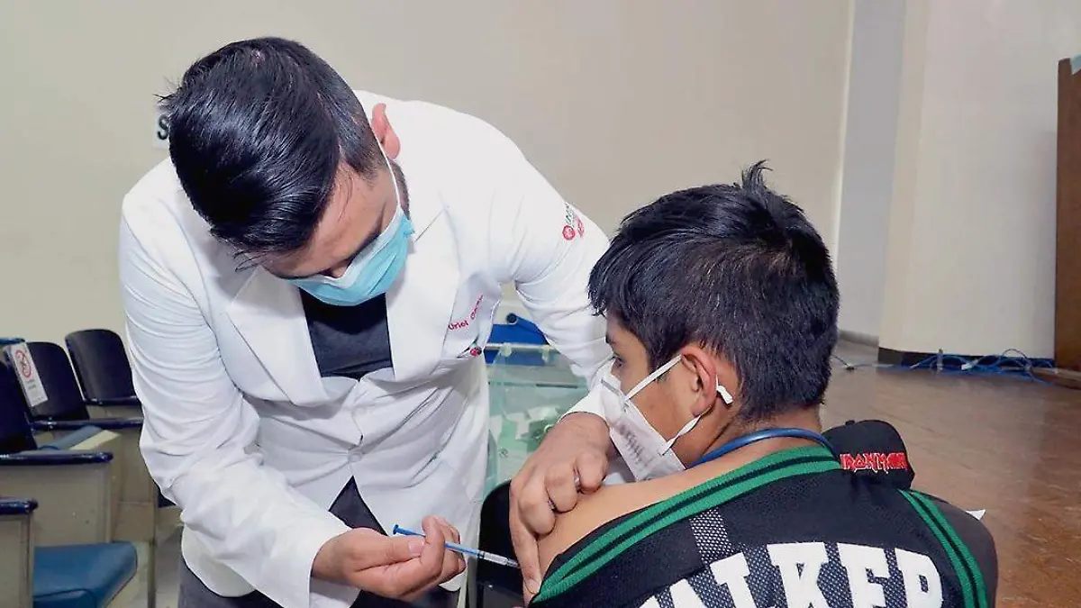 Aplicación de vcuna contra covid-19