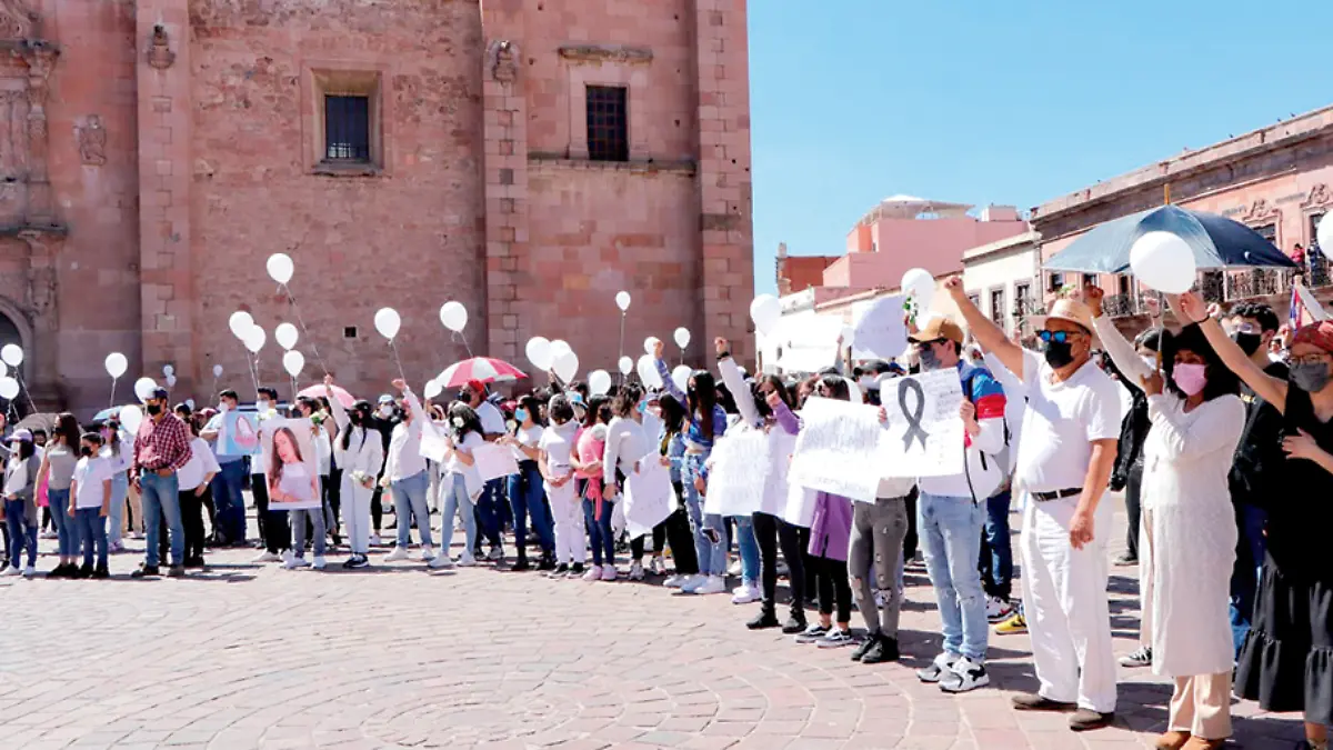 protesta en honor de jóvenes asesinados