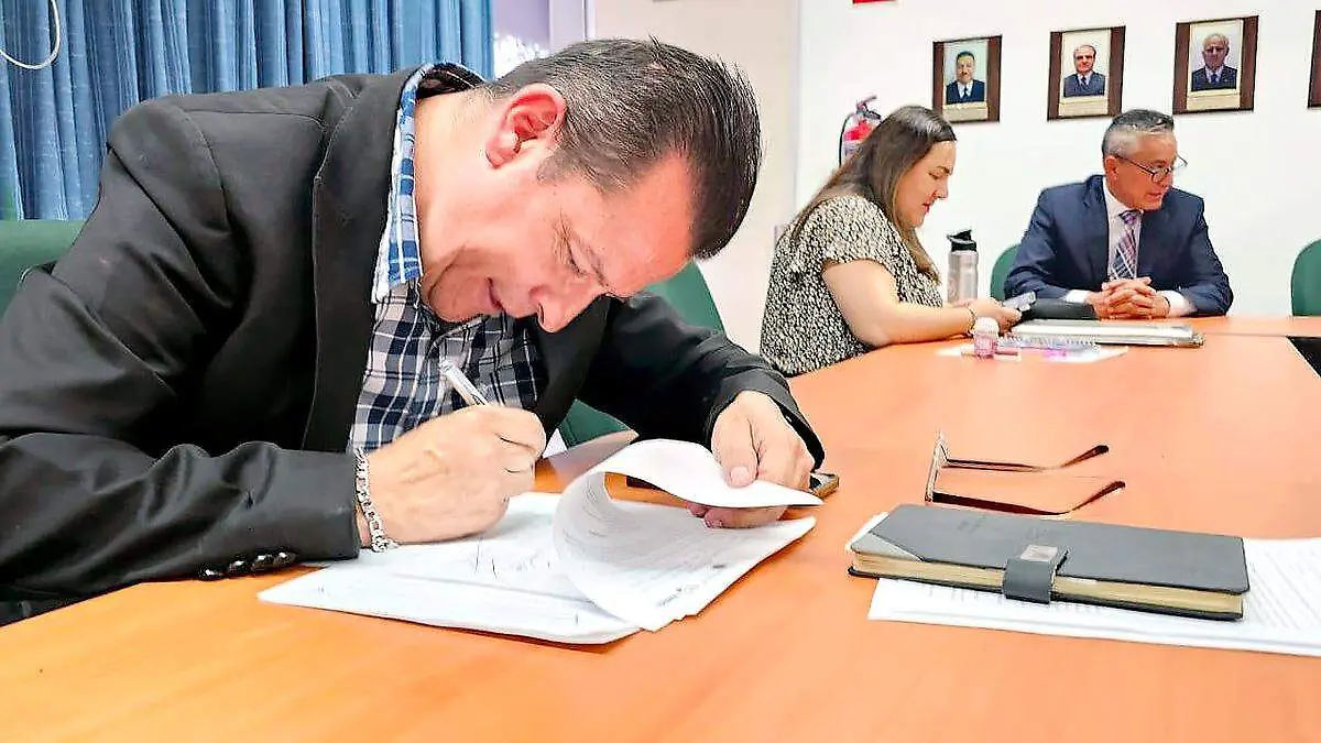 Firma de minuta de acuerdos