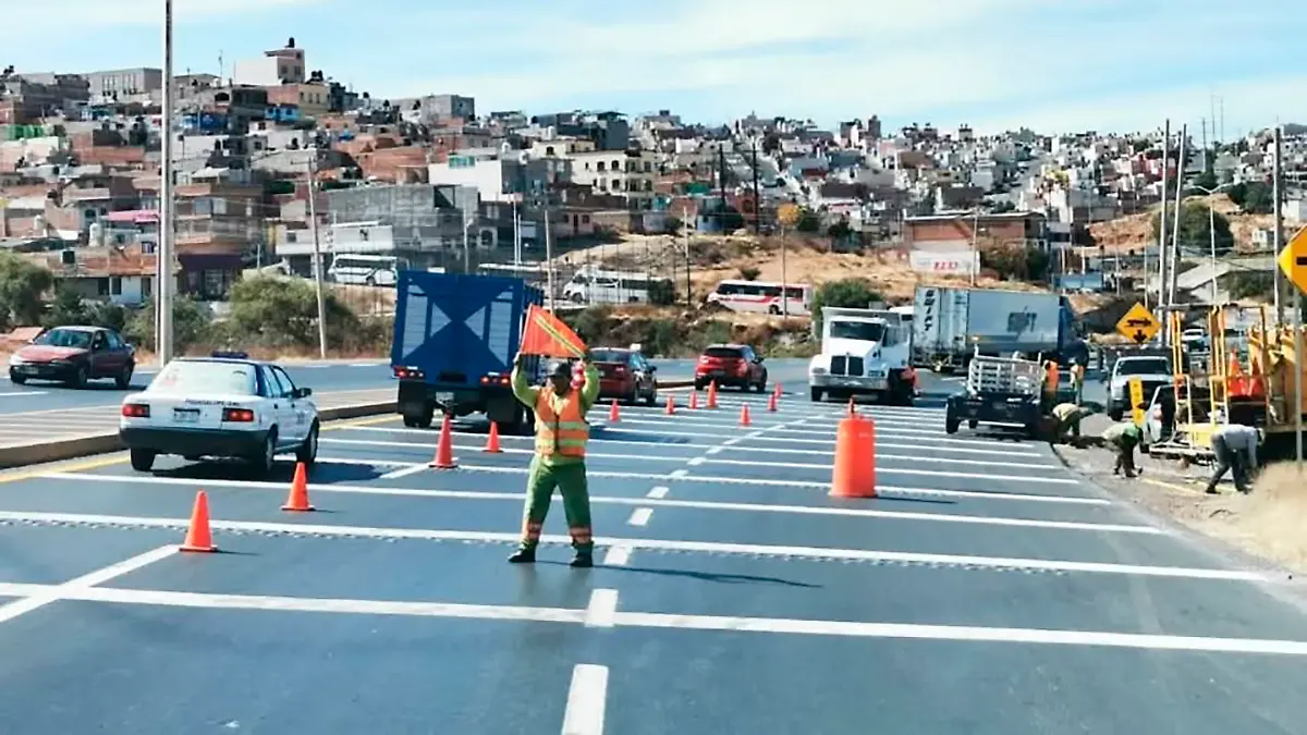 Trabajadores de pavimentación de carretera