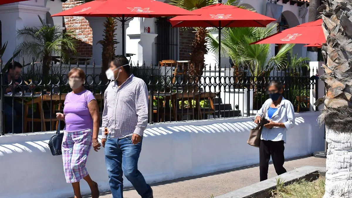 pesonas calles cubreboca la paz