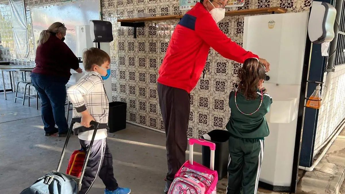 Brote covid en escuelas