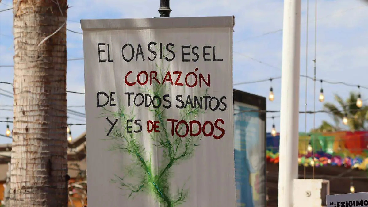 pancarta protesta oasis todos santos