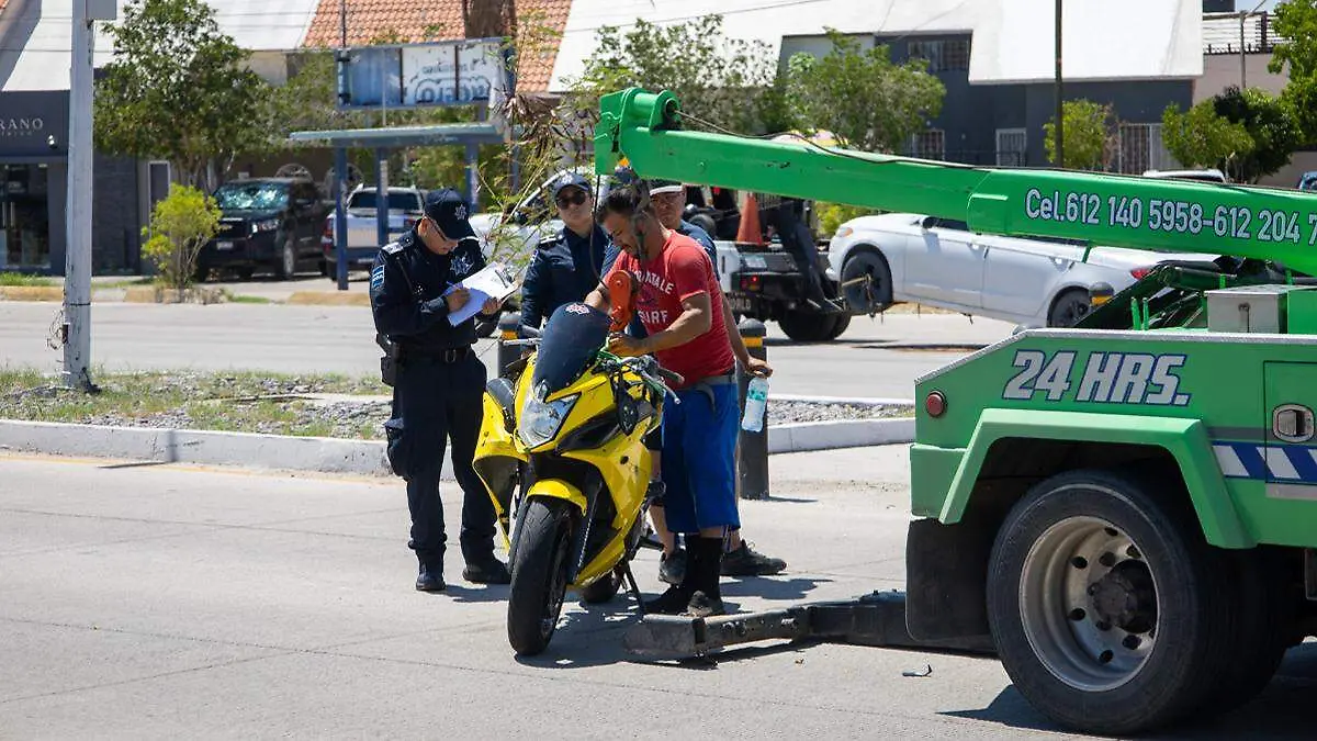 motociclista atropellado grua accidente en moto