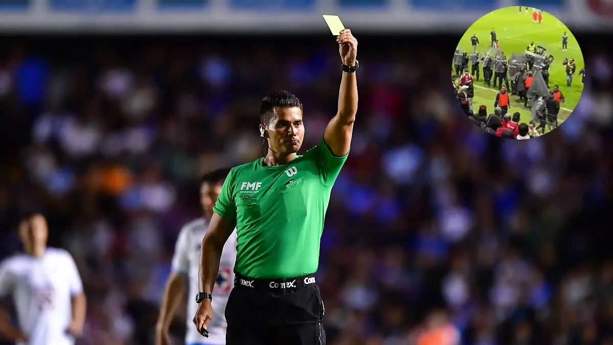 El árbitro Guillermo Pacheco salió escoltado de la cancha del Nemesio Diez. Foto: Mexsport