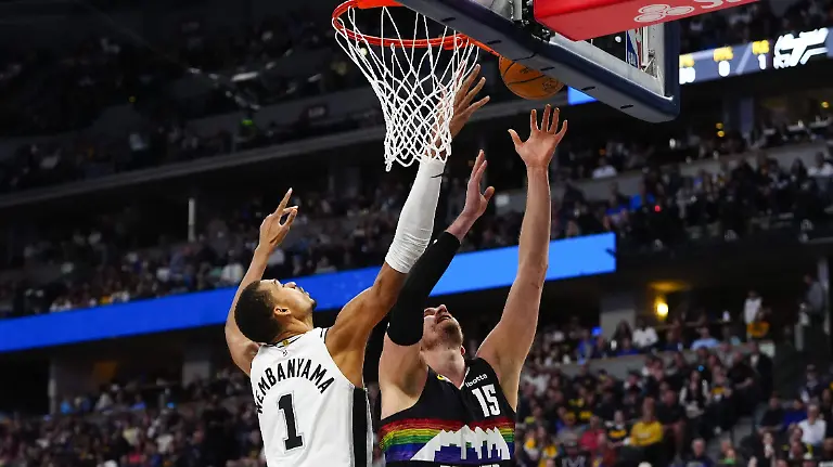 2026-04-04T195344Z_42758086_MT1USATODAY28658803_RTRMADP_3_NBA-SAN-ANTONIO-SPURS-AT-DENVER-NUGGETS