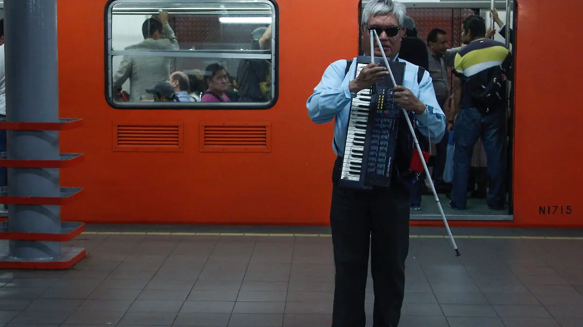 371041_Invidente Metro_impreso