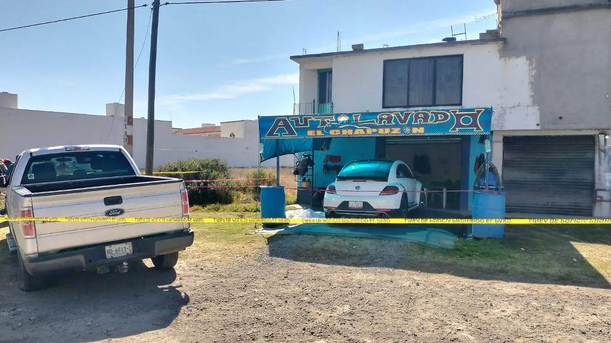 HOMICIDIO AUTOLAVADO