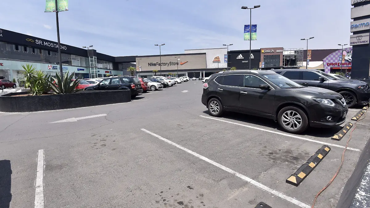 702292_Aumenta tiempo gratis estacionamiento _impreso