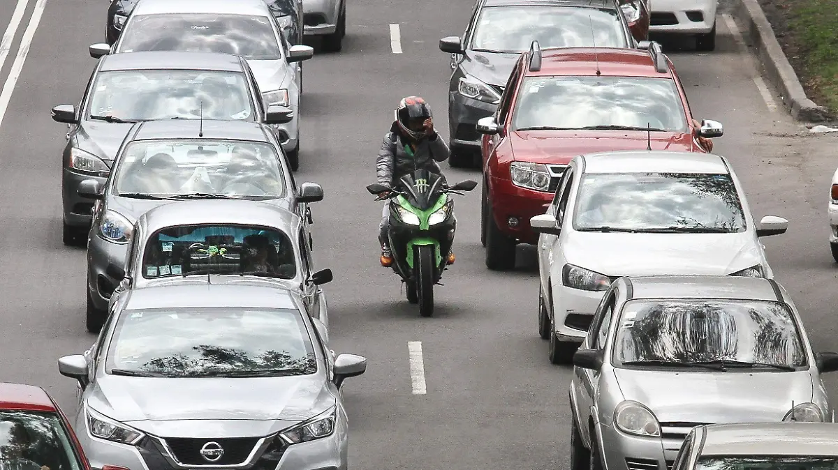 828830_Motociclistas ciudad_impreso