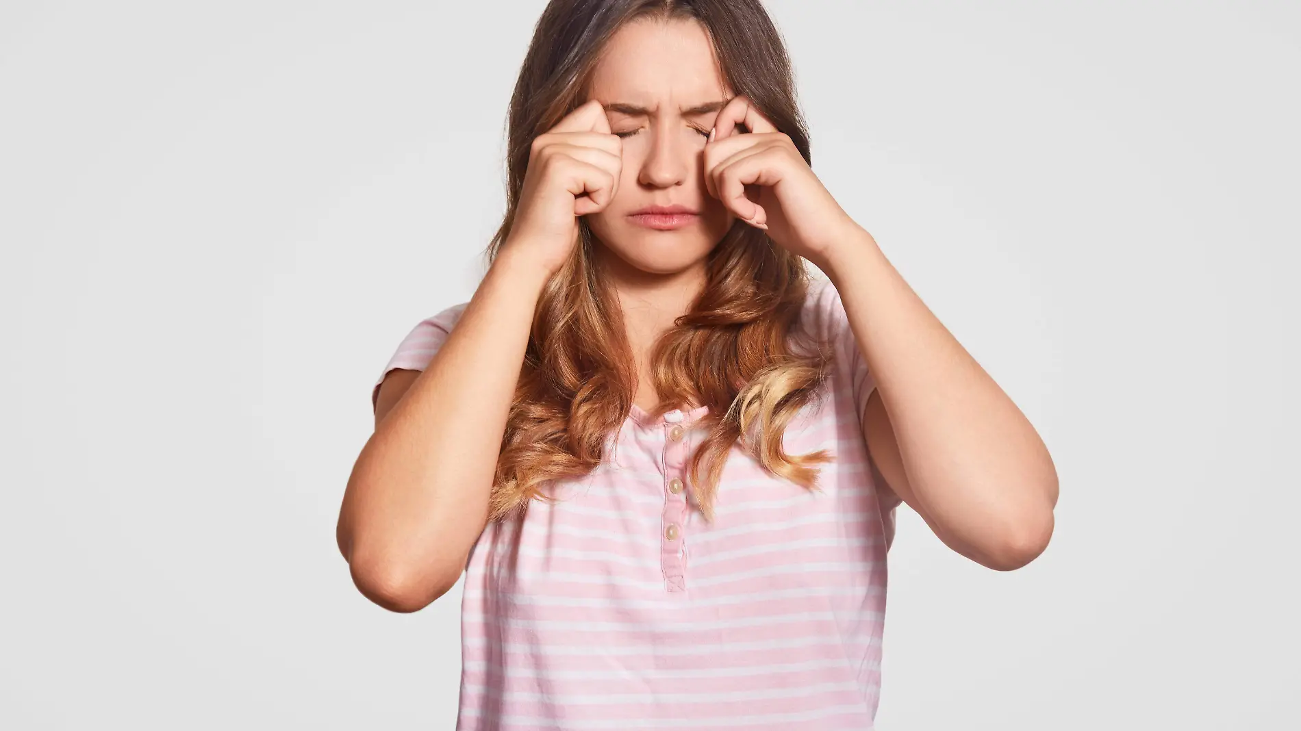 photo-displeased-young-girl-rubs-eyes-being-low-spirit-wears-casual-domestic-clothes-poses-white-woman-had-bad-sleep-night-bedding-concept-people-tiredness