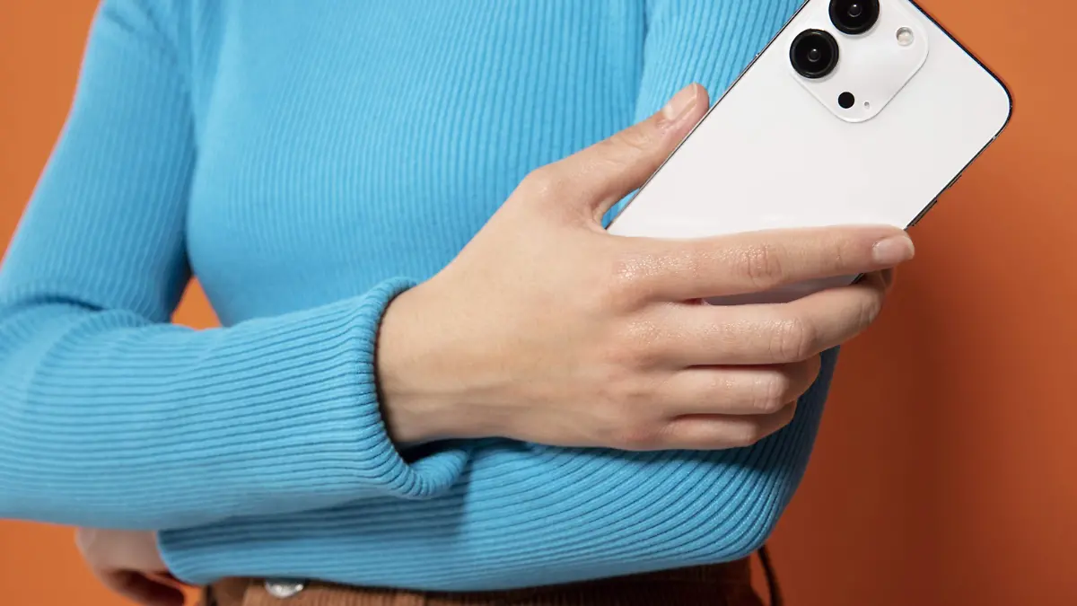 front-view-of-woman-showing-her-smartphone