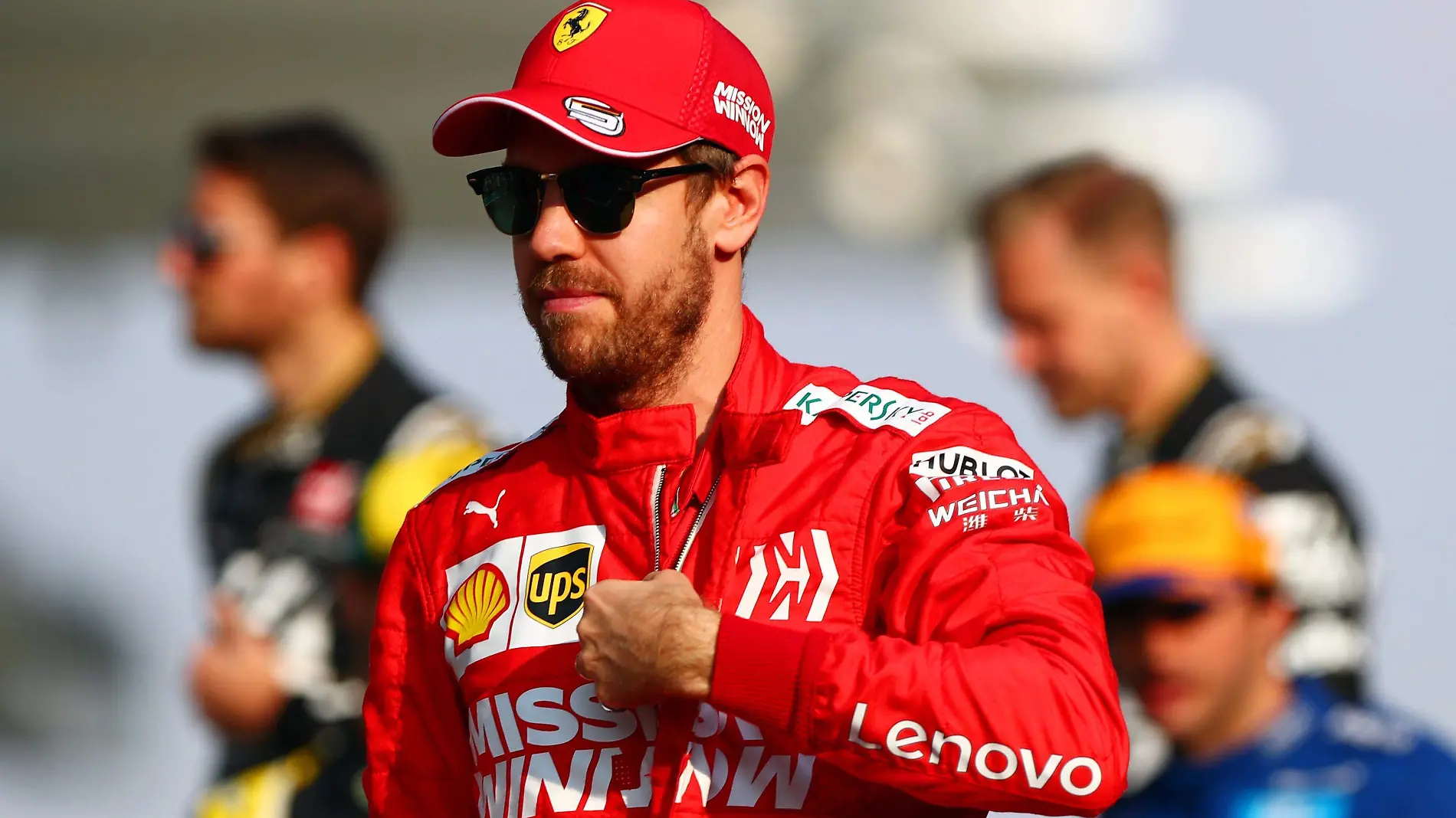 sebastian-vettel-of-germany-and-ferrari-looks-on-before-the-news-photo-1587398656